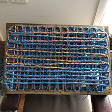 recycled bailing twine mat being made on loom
